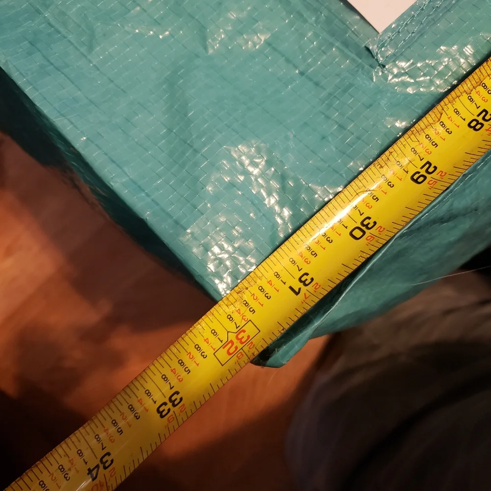 #3 - Garment bag - large. New in package. Never used. Heavy duty material.